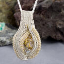 bold wire wrapped gold quartz necklace in silver and 22k front