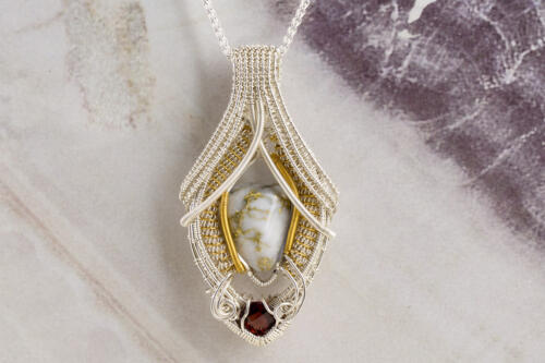 wire wrapped gold quartz and garnet necklace in silver and 22k front