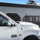 A truck in front of the Arden Jewelers storefront to break a chain