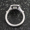 Custom emerald cut diamond halo engagement ring with engraved accents top