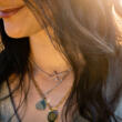 50 percent engravable jewelry with picture of layered chain look with cross heart and circle pendants