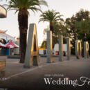 The California sign in front of Cal Expo with the International Wedding Festival logo beneath it