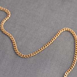 A rose gold curb chain