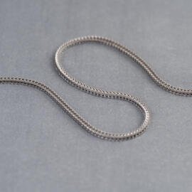 A white gold foxtail chain