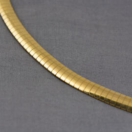 A yellow gold omega chain