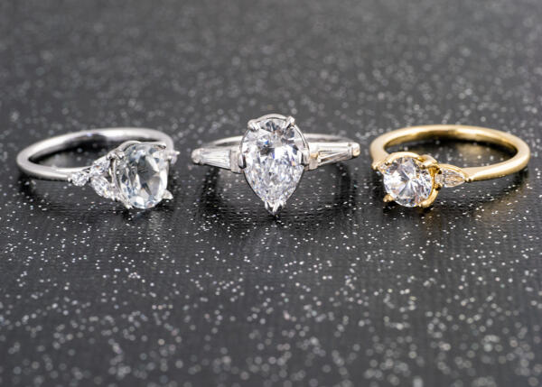 Three accented solitaire engagement rings