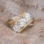 Custom three stone two tone engagement ring front view