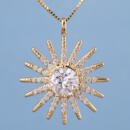 Large custom sun starburst pendant with lab diamonds in 18k yellow gold front view with blue backgorund