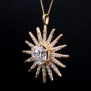 Large custom sun starburst pendant with lab diamonds in 18k yellow gold close side view