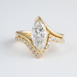 Custom marquise diamond wedding set in yellow gold front view