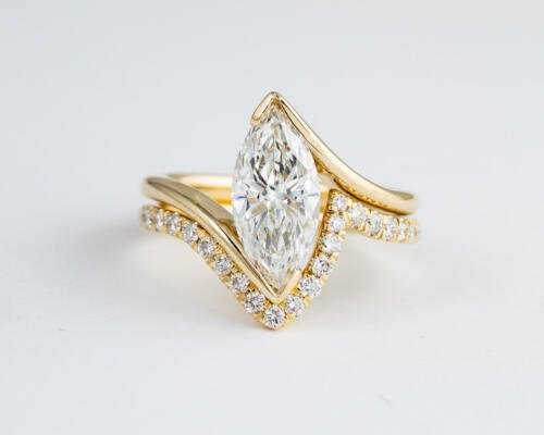 Custom marquise diamond wedding set in yellow gold front view