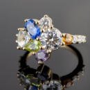 Custom abstract colored stone cluster ring angled view