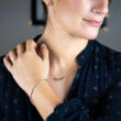 A beautiful model wearing three pieces for the Lab Diamond Favorites collection